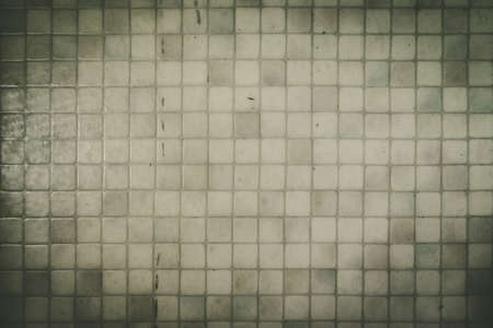 Old vintage grey tiles background. Texture wallpaper