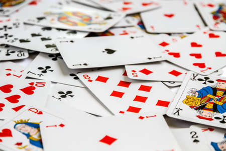 Classic playing card game laid out on a table. White background