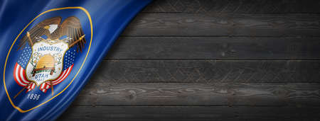 Utah flag on black wood wall banner, USA. 3D illustration