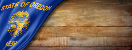 Oregon flag on old wood wall banner, USA. 3D illustrationの写真素材