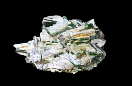 Actinolite in talc gemstone isolated on a black background