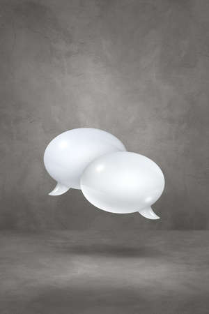 3D white speech bubbles isolated on grey vertical backgroundの写真素材