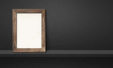 Wooden picture frame leaning on a black shelf. 3d illustration. Blank mockup template. Horizontal bannerの写真素材