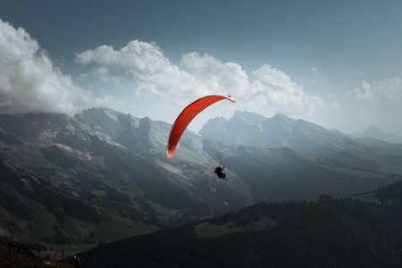 paragliding flight in the mountains. Le Grand-Bornand, Haute-Savoie, Franceの写真素材