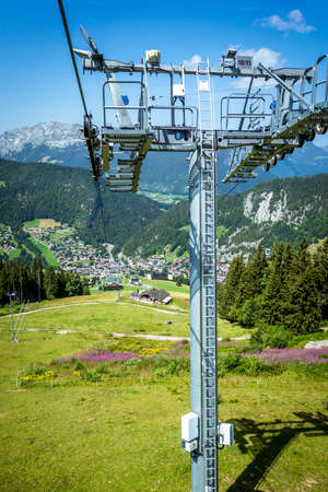 Chair lift above the village of La Clusaz in summer, Franceの写真素材