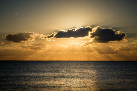 Perfect flaming seascape view from a beach at sunset