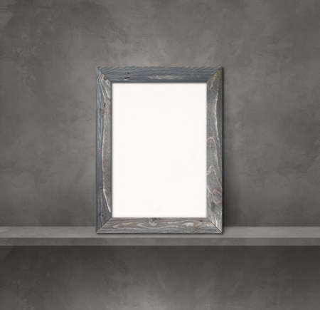 Wooden picture frame leaning on a grey shelf. 3d illustration. Blank mockup template. Square...