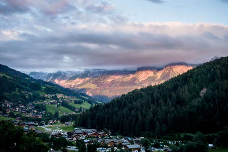 Sunset on The Grand-Bornand village and the Aravis mountain range, Franceの写真素材