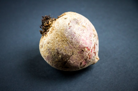 Fresh organic beetroot on a black table backgroundの写真素材