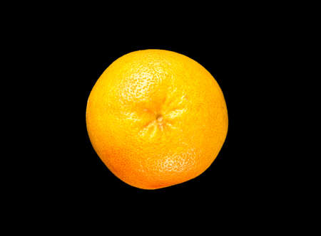 Orange grapefruit isolated on a black background