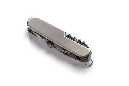 Metallic swiss knife isolated on white background