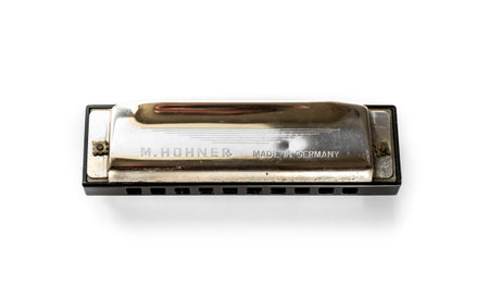 Paris - France - March 1, 2022 : Vintage M. Hohner harmonica isolated on a white backgroundのeditorial素材