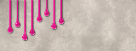 Pink ink drops isolated on light concrete wall. Horizontal banner. 3D illustrationの写真素材