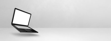 Blank computer laptop floating over a white background. 3D isolated illustration. Horizontal banner templateの写真素材