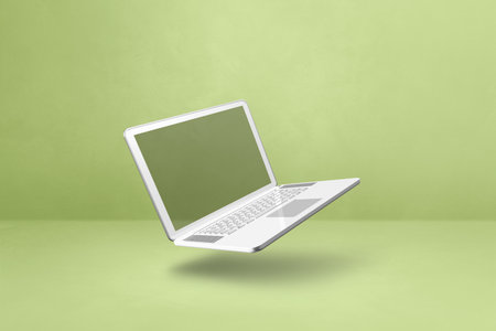 Blank computer laptop floating over a green background. 3D isolated illustration. Horizontal templateの写真素材