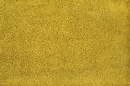 Yellow suede leather texture background. Natural material pattern.の写真素材