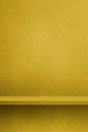 Empty shelf on a green ocher concrete wall. Background template scene. Vertical mockupの写真素材
