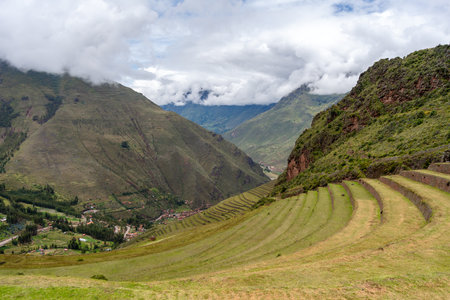 The archaeological site of Pisac features impressive stone terraces and ruins nestled in the lush...