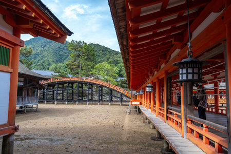 Traditional wooden buildings of Itsukushima shrine, a historic Shinto complex built over the water on Miyajima Island, Japanの写真素材