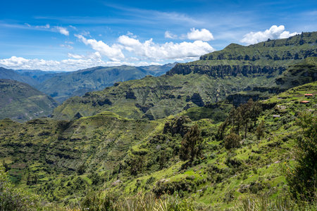 The Waqrapukara site in Peru features dramatic rock formations, green valleys, and steep cliffs,...