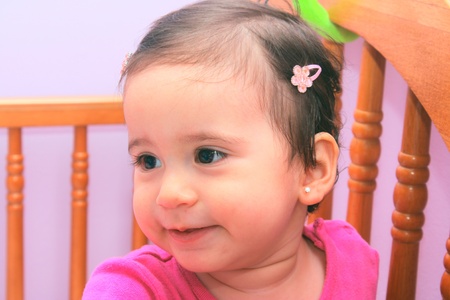 One year old baby at nurseryの写真素材