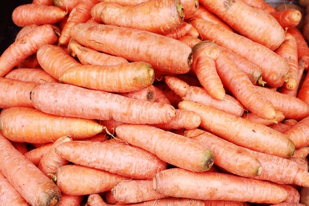 A background of the fresh young carrots.の写真素材