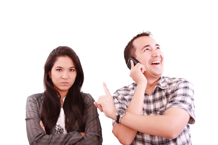 happy man talking on the phone, forgetting about his wife の写真素材