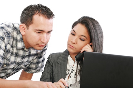 business woman giving a working advice to young man の写真素材