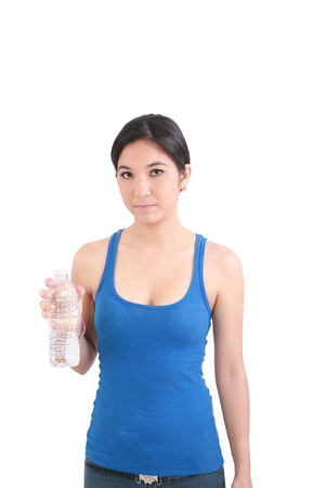 portrait of woman in fitness attire holding water bottle and smilingの写真素材
