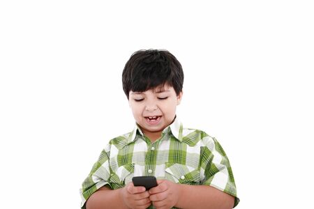 Boy text messaging isolated over white の写真素材