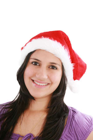 Beautiful christmas woman in santa hat の写真素材
