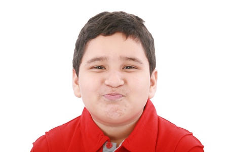 Funny child with red shirt isolated on white background の写真素材