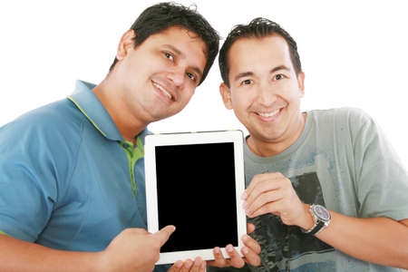 Two young men or businessmen showing a tablet PC computer and smiling の写真素材
