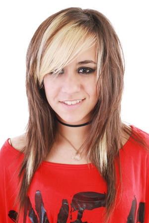Head and shoulders portrait of an attractive young woman with wild blond hairの写真素材