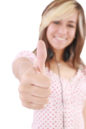 Isolated portrait of beautiful young success woman giving thumbs up on white background. Focus on handsの写真素材