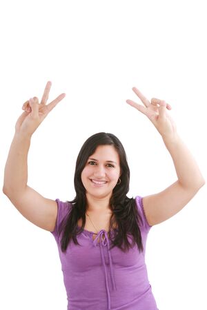 beautiful smiling woman making victory sign with both of her hands, smiling and looking into the cameraの写真素材