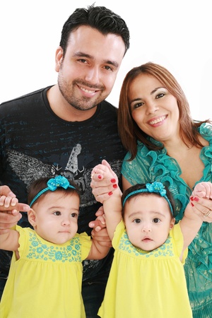 Young family with twin girlsの写真素材