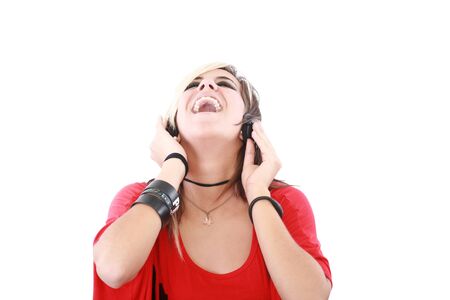 Young woman with a cool rocker style listening to music 
の写真素材