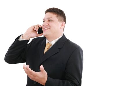 Business man talking on the phone isolated over white の写真素材