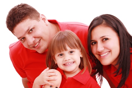 Portrait of family looking at camera on a white background の写真素材