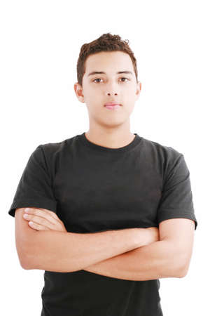 Young man in black shirt with arms crossed isolated on whiteの写真素材