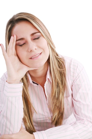 Woman having a headache, isolated on whiteの写真素材
