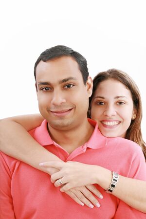 Young love couple smiling. Over white background の写真素材