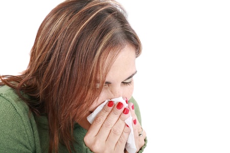 Sick woman with tissue on white の写真素材