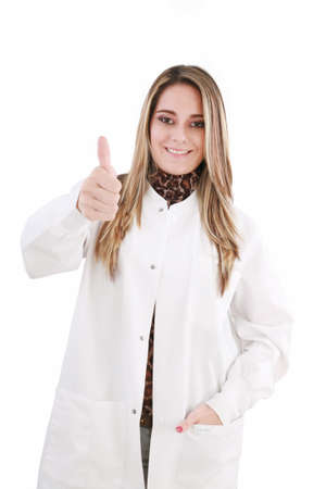woman in medical uniform giving one thumb up. isolated on white background 
の写真素材