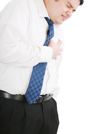 Man dressed in formal wear having a heart attack 
の写真素材
