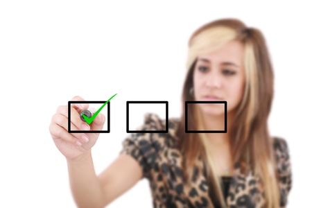 Young woman business hand with pen mark the check boxes  Hands on focus