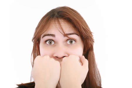 scared woman screaming with hands on the mouth isolated on white background の写真素材