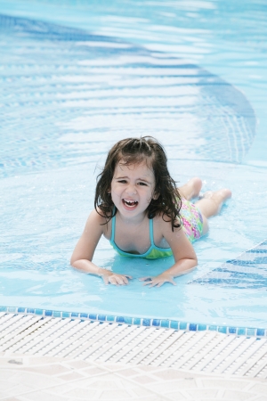little girl in the pool の写真素材