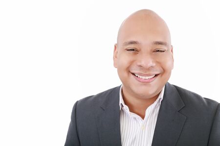 Handsome businessman smiling - isolated over a white backgroundの写真素材